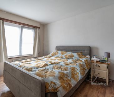 GELIJKVLOERS APPARTEMENT MET 2 SLPKS, GARAGE EN TUIN - Photo 5