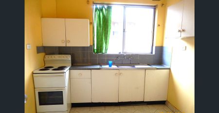 2 BEDROOM ON FIRST FLOOR UNIT, TILES FLOORING THOUGHT OUT. CLOSE TO SCHOOL. - Photo 4