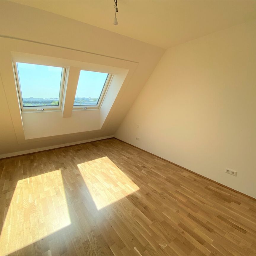 Wunderschöne 3 Zimmer Dachgeschosswohnung mit 40 m² Terrasse - Foto 1