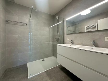 Nieuwbouwappartement met autostaanplaats in groene, bosrijke omgeving te Ranst. - Photo 5