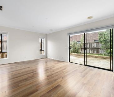 LIGHT-FILLED FAMILY HOME IN A CONVENIENT LOCATION - Photo 1