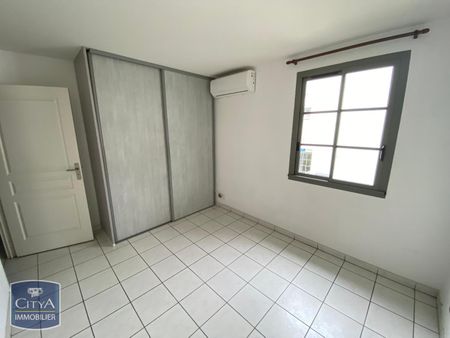 Location Appartement 2 pièces 50m² ST DENIS 97400 - Photo 4