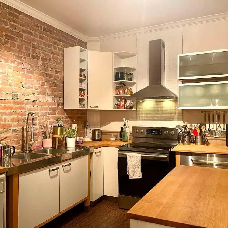 Superbe 5 1/2 de 1200 pi2 alliant cachet d’époque et confort dans HOMA - Photo 1