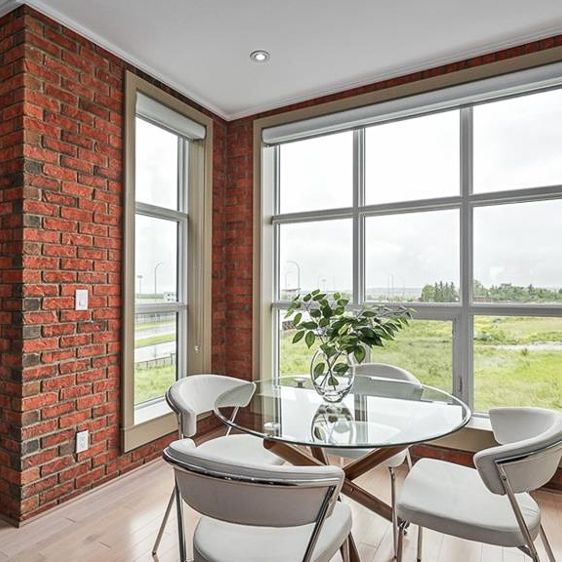 Upscale 3 Storey Townhome. Gourmet Kitchen, Private Elevator, Lock And Leave Ease. - Photo 1