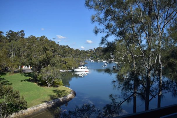 Fully Furnished Apartment with Water Views - Photo 1