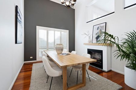 LIGHT-FILLED FAMILY RETREAT OFFERING SPACE AND CONVENIENCE - Photo 4