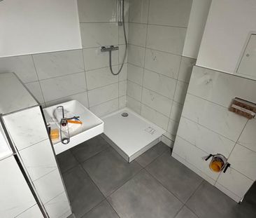 Erstbezug! Moderne, frisch sanierte Dachgeschosswohnung - Photo 1