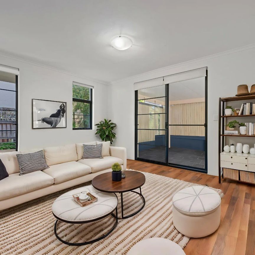 Private, Light Filled Living in a Boutique Townhome - Photo 1