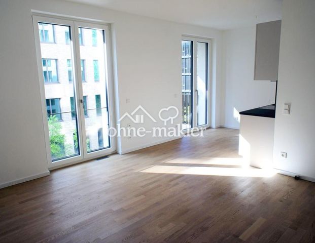 Exklusives Neubau-Apartment im "PURE Living" mit Wasserblick - Foto 1
