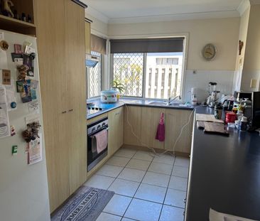 Comfortable Family Living with Large Backyard & Pool in Secure Complex - Photo 6