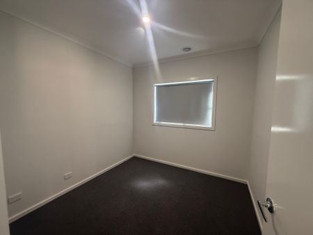 Modern Four-Bedroom Home with Contemporary Brick Features & Double Garage - Photo 2