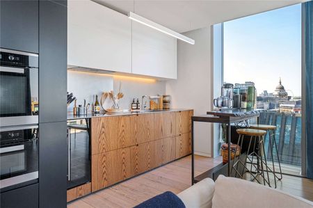 A top floor two bedroom apartment with stunning views in the Barts Square development. - Photo 5