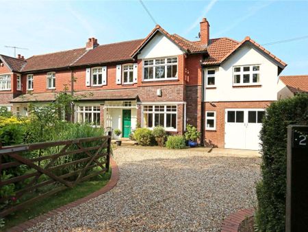 A superb family home offering flexible accommodation of four/five bedrooms with garage, garden and off street parking. - Photo 3