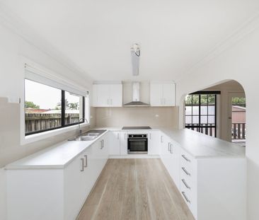 Spacious Family Living with large Backyard in a Prime Location. - Photo 6