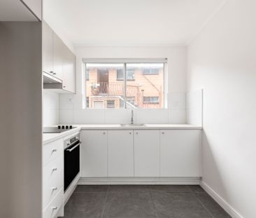 Stylish Two-Bedroom Living in a Convenient Location - Photo 4