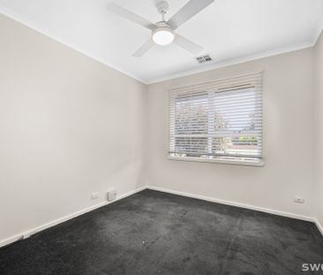 Conveniently positioned modern two bedroom unit with lock up garage - Photo 4