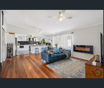 Flawlessly Renovated Family Haven with Dual-Level Flexibility - Photo 2