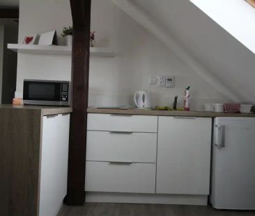 Pronájem podkrovního bytu 1+kk s terasou, 36 m - Photo 1