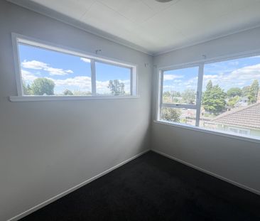 Step into comfort and convenience with this upstairs unit, freshly ... - Photo 6