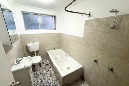 Spacious 2-Bedroom Unit with Renovated Kitchen & Timber Flooring - Photo 4