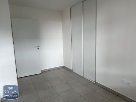 Location Appartement 4 pièces 74m² BEAUZELLE 31700 - Photo 4