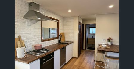 Coastal Charm with Stunning Views & the Ultimate Dream Shed - Photo 2