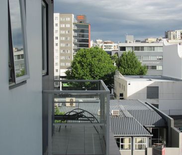 Light and Bright Furnished Corner Apartment with Balcony - Photo 3