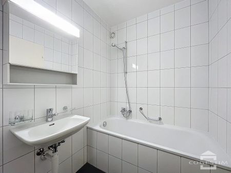 Agréable appartement de 3 pièces au 1er étage proche du centre ville - Photo 3