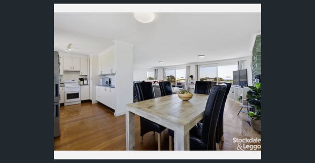 Beachside Family Home with Water Views - Photo 1