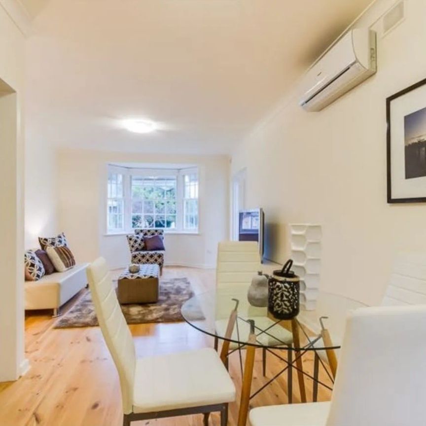 Stylish, Low-Maintenance Living in a Boutique Group of Four - Photo 1