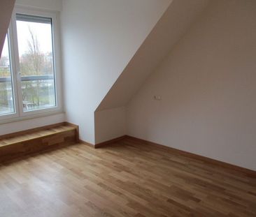 Toll ausgebaute 3-Zimmer-Dachgeschoss-Wohnung mit Balkon - Foto 1