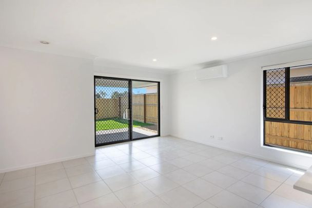 A modern sanctuary in a peaceful, family-friendly pocket, this beautifully finished 4-bedroom home delivers effortless living with a touch of luxury. - Photo 1