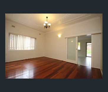 ULTRA CONVENIENTLY LOCATED FAMILY HOME - Photo 1