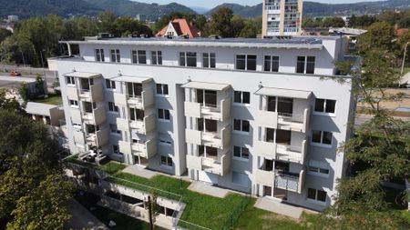 Sehr schöne Neubauwohnung mit Garten und Terrasse - Photo 2