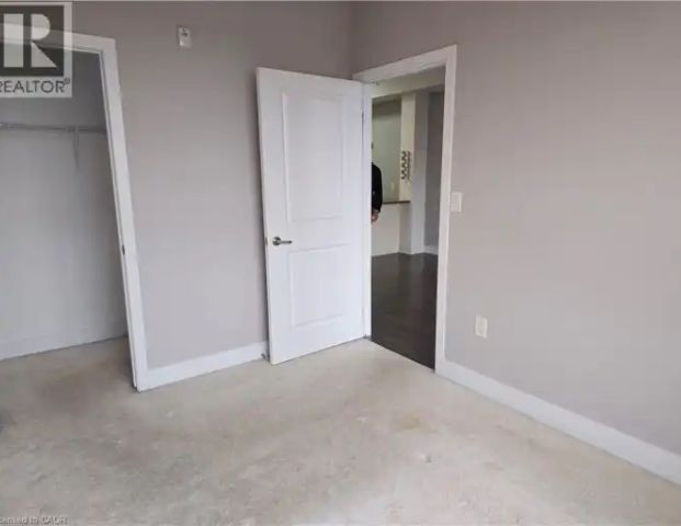 5020 CORPORATE Drive Unit# 409 | 5020 CORPORATE Drive Unit# 409, Burlington - Photo 1