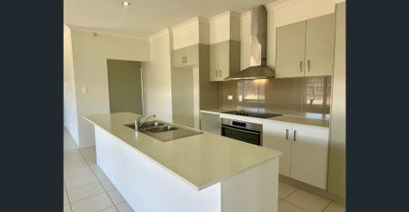 Spacious 4-Bedroom, 4-Bathroom Home - Available Now! - Photo 4