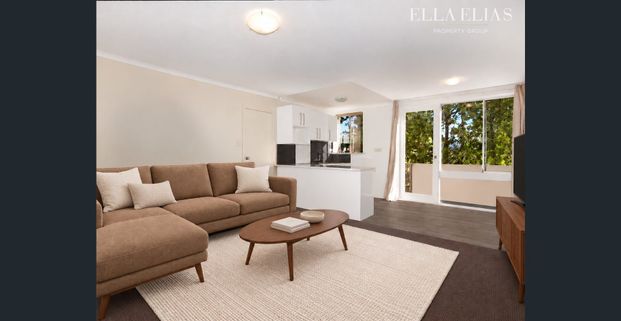 Well-Appointed Two Bedroom Apartment | Prime Location - Photo 1