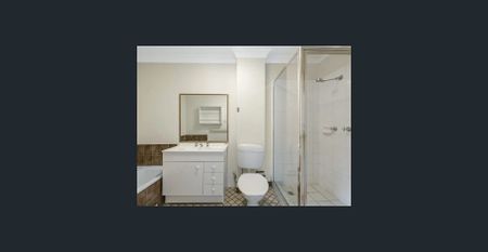 SPACIOUS TOWNHOUSE IN CONVENIENT LOCATION - Photo 3