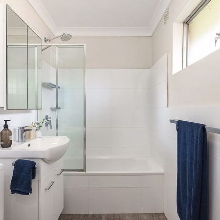 Top Floor Coastal Living with Light, Privacy and Lifestyle Convenience - Photo 4