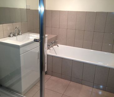 Positioned in a quiet and convenient pocket of Meadow Heights, this... - Photo 6