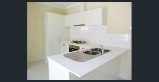 Modern Coastal Living in a Private Laneway Setting - Photo 1