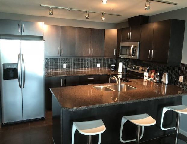 Furnished, Spacious 2 bed 2 bath - Unobstructed South view | 2707 - 210 15 Ave SE, Calgary - Photo 1