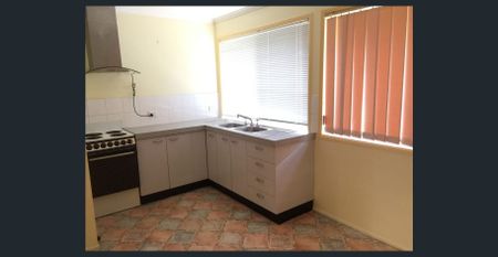 Comfortable Low-Set Brick Home in a Convenient Location - Photo 4