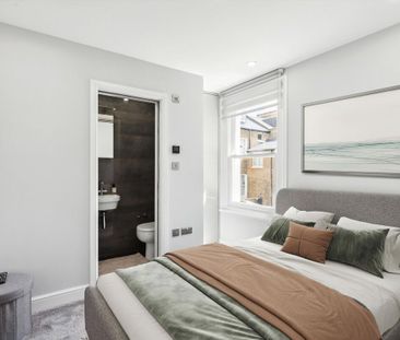 A beautifully presented five-bedroom townhouse with a private garde... - Photo 3