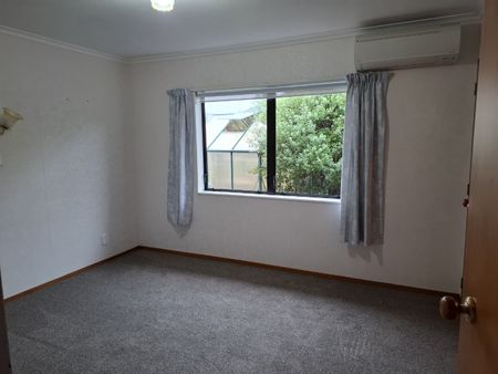 This fantastic family home offers a generous open-plan living on the ground floor, seamlessly flowing out to a rear patio and fully fenced yard—perfect for entertaining or relaxing with family. - Photo 3