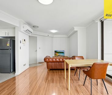 FURNISHED ONE BEDROOM SUN-DRENCHED NORTHEAST CORNER - Photo 1