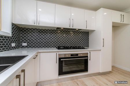 Family Comfort in a Quiet Glenmore Park Cul-de-sac - Photo 2