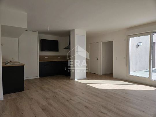 Grand appartement F4 avec 2 balcons et 2 places de parkings - Photo 1