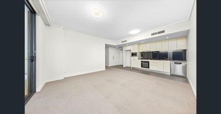 Mirvac Built | Great Location | Large Living Area | Huge Courtyard - Photo 2