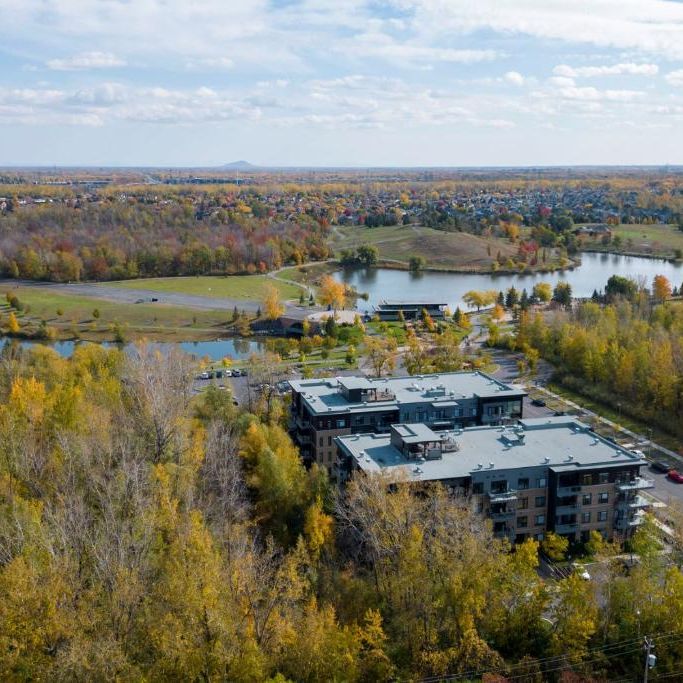 4 1/2 grand Condo locatif au cœur du Parc de La Cité à St-Hubert - Photo 1